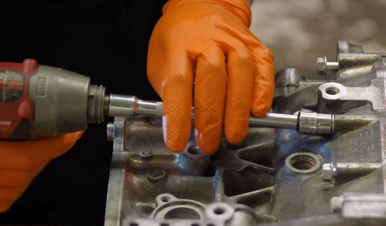 Mechanic working on an auto repair inside Green Light Automotive